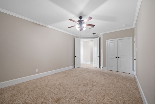 19522 Hope Springs Ln, Cypress, TX 77433 - unfurnished bedroom with light colored carpet, ornamental molding, a closet, and a ceiling fan