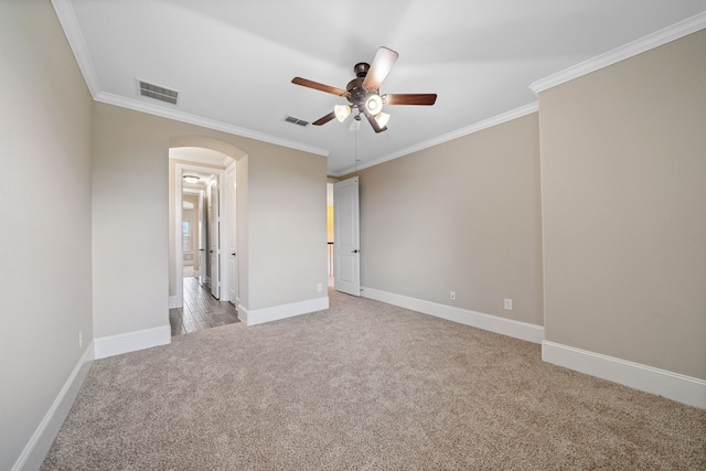 19522 Hope Springs Ln, Cypress, TX 77433 - unfurnished bedroom with carpet, arched walkways, crown molding, and a ceiling fan