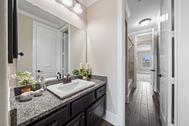 19522 Hope Springs Ln, Cypress, TX 77433 - full bathroom featuring crown molding, vanity, and wood tiled floors