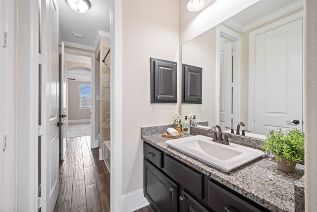 19522 Hope Springs Ln, Cypress, TX 77433 - full bathroom with vanity, crown molding, and wood finished floors