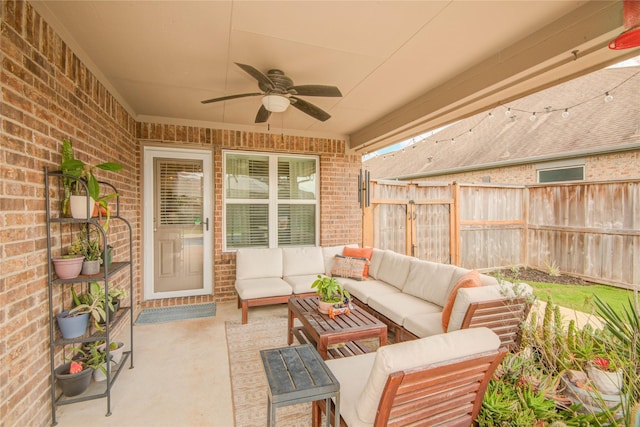 115 Meadow Ridge Way, Clute, TX 77531 - fenced backyard featuring outdoor lounge area, a ceiling fan, and a patio