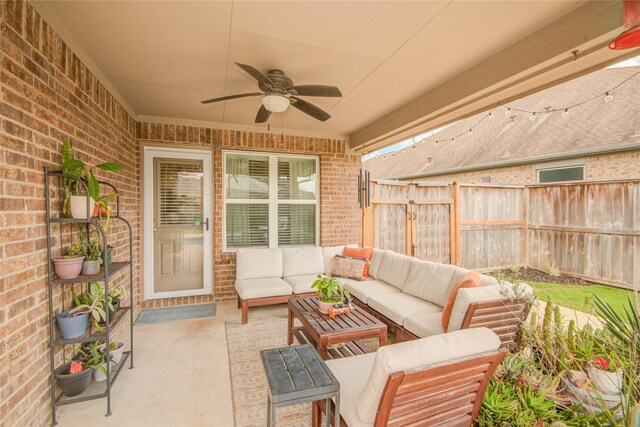 115 Meadow Ridge Way, Clute, TX 77531 - fenced backyard featuring outdoor lounge area, a ceiling fan, and a patio