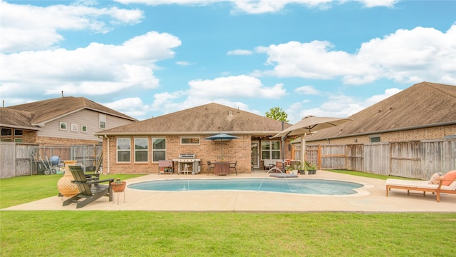 115 Meadow Ridge Way, Clute, TX 77531 - view of pool featuring a fenced backyard and a patio