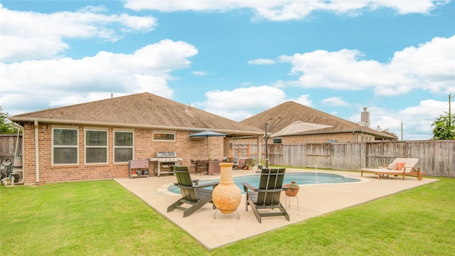 115 Meadow Ridge Way, Clute, TX 77531 - view of pool with a fenced backyard, a patio area, and grilling area