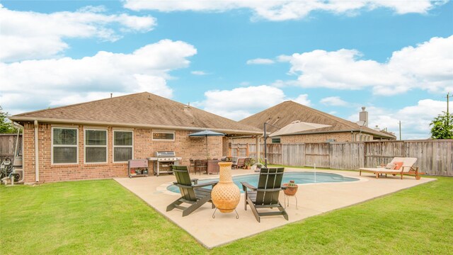 115 Meadow Ridge Way, Clute, TX 77531 - view of pool with a fenced backyard, a patio area, and grilling area