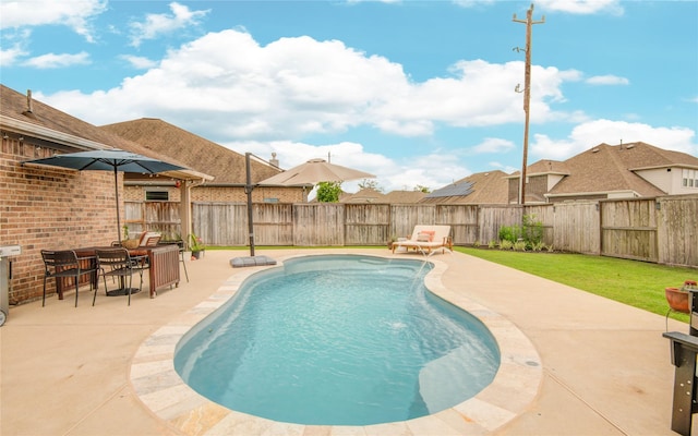 115 Meadow Ridge Way, Clute, TX 77531 - view of swimming pool with a patio area and a fenced backyard