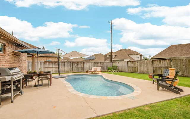 115 Meadow Ridge Way, Clute, TX 77531 - view of pool with a patio, area for grilling, and a fenced backyard