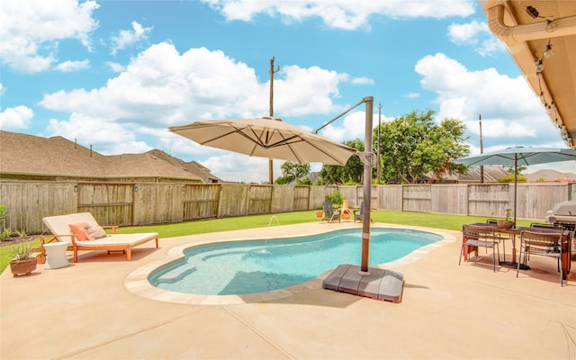 115 Meadow Ridge Way, Clute, TX 77531 - view of swimming pool with a patio, a fenced backyard, and outdoor dining space