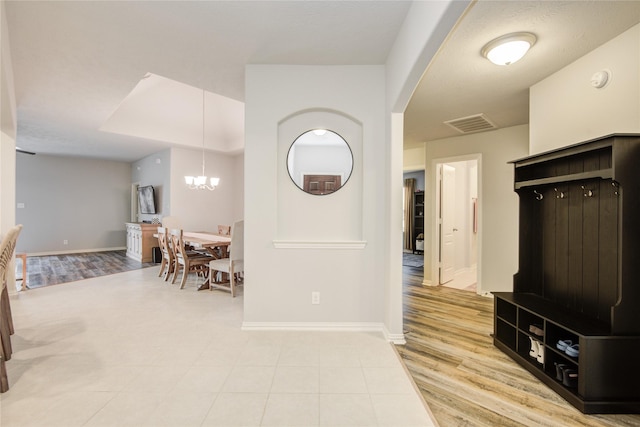 115 Meadow Ridge Way, Clute, TX 77531 - interior space with a chandelier and baseboards