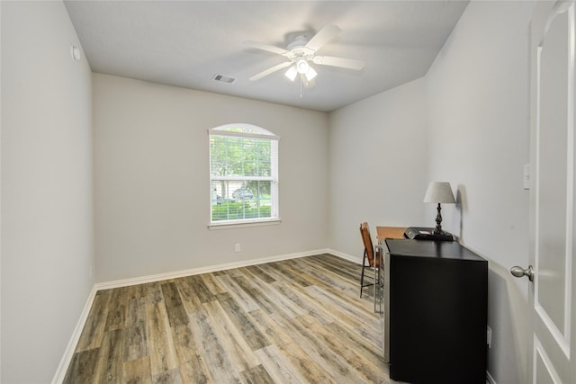 115 Meadow Ridge Way, Clute, TX 77531 - office with light wood-style flooring and a ceiling fan