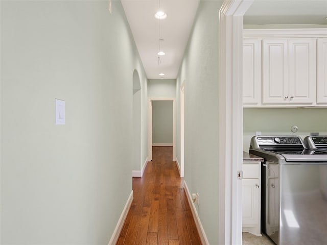 4635 Beech St, Bellaire, TX 77401 - hall featuring wood finished floors, recessed lighting, and separate washer and dryer