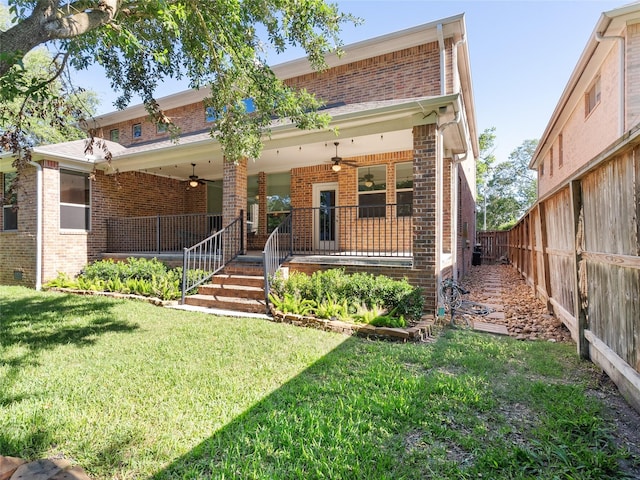 4635 Beech St, Bellaire, TX 77401 - view of front of house with ceiling fan, brick siding, and covered porch