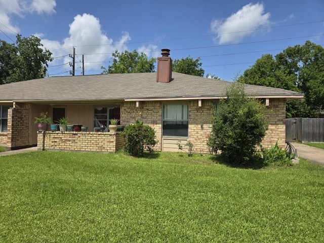 3902 Quiet Place Dr, Houston, TX 77082 - back of property featuring a chimney and brick siding