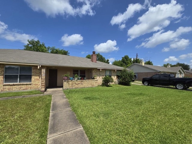 3902 Quiet Place Dr, Houston, TX 77082 - single story home with a front yard, brick siding, and a chimney