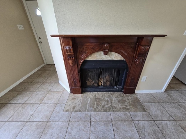3902 Quiet Place Dr, Houston, TX 77082 - detailed view of a fireplace with flush hearth and baseboards