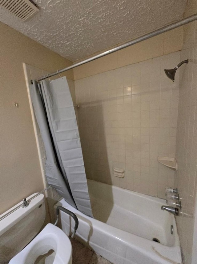 3902 Quiet Place Dr, Houston, TX 77082 - full bath featuring shower / bathtub combination with curtain and a textured ceiling