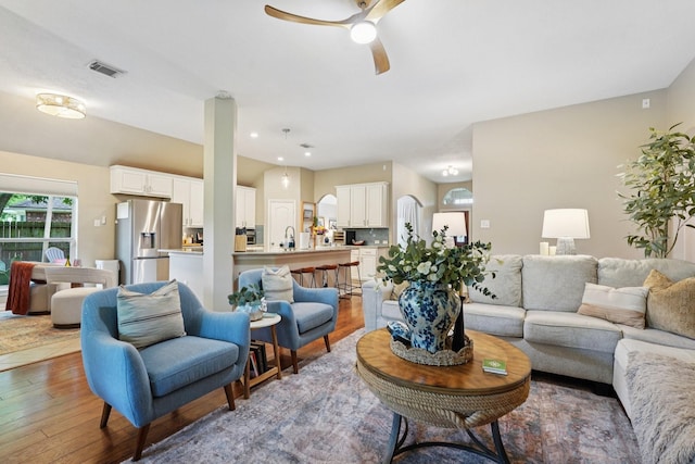 1095 Gladstone Dr, League City, TX 77573 - living area featuring wood-type flooring and a ceiling fan