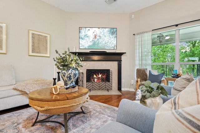 1095 Gladstone Dr, League City, TX 77573 - living area featuring wood finished floors and a fireplace with flush hearth