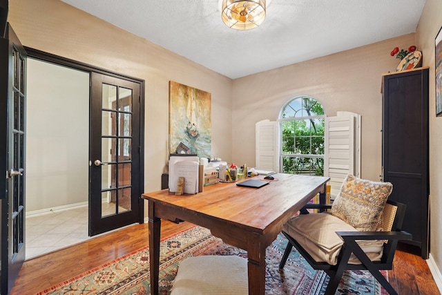 1095 Gladstone Dr, League City, TX 77573 - office area with light wood-style flooring and french doors