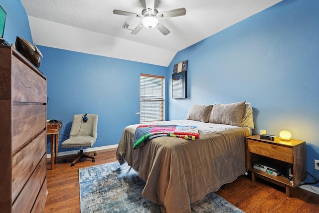 1095 Gladstone Dr, League City, TX 77573 - bedroom featuring vaulted ceiling, wood finished floors, and a ceiling fan
