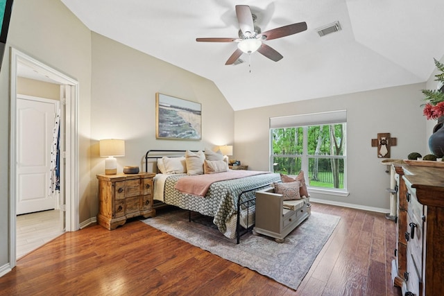 1095 Gladstone Dr, League City, TX 77573 - bedroom with vaulted ceiling, hardwood / wood-style flooring, and a ceiling fan