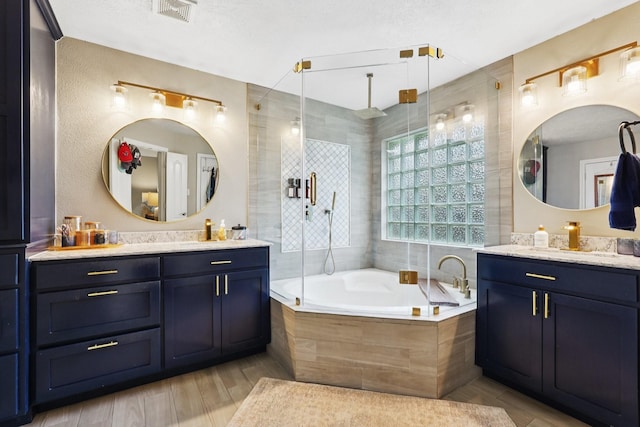 1095 Gladstone Dr, League City, TX 77573 - full bath with tiled bath, vanity, and a tile shower