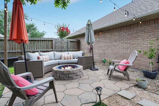 1095 Gladstone Dr, League City, TX 77573 - view of patio / terrace with an outdoor living space with a fire pit
