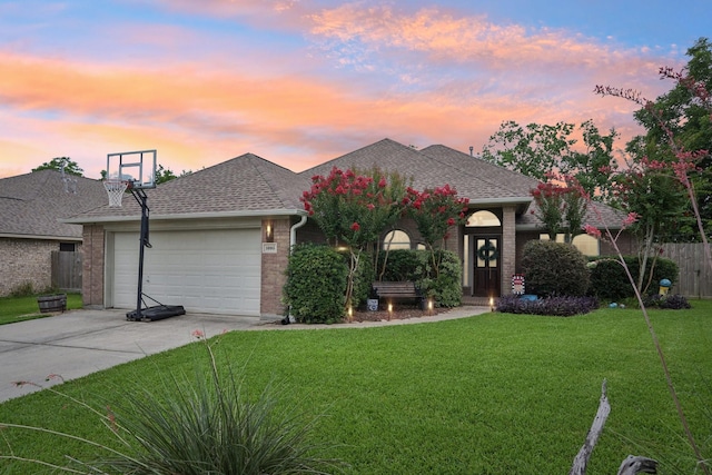 1095 Gladstone Dr, League City, TX 77573 - view of front of home featuring driveway, an attached garage, a shingled roof, and brick siding