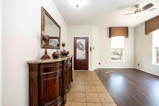 9859 Clanton Pines Dr, Humble, TX 77396 - entrance foyer with ceiling fan and light tile patterned flooring