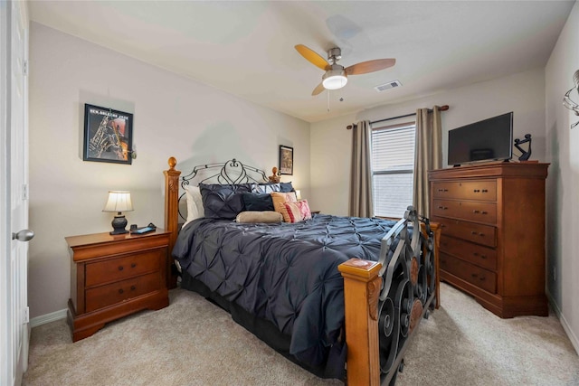 9859 Clanton Pines Dr, Humble, TX 77396 - bedroom with light colored carpet and a ceiling fan