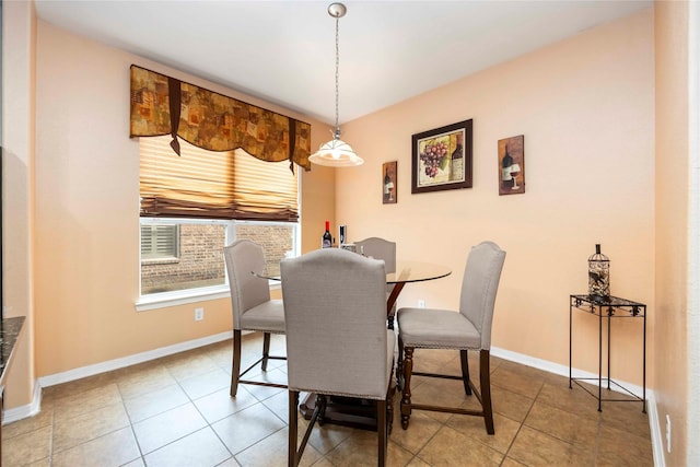 9859 Clanton Pines Dr, Humble, TX 77396 - dining room featuring baseboards and tile patterned floors