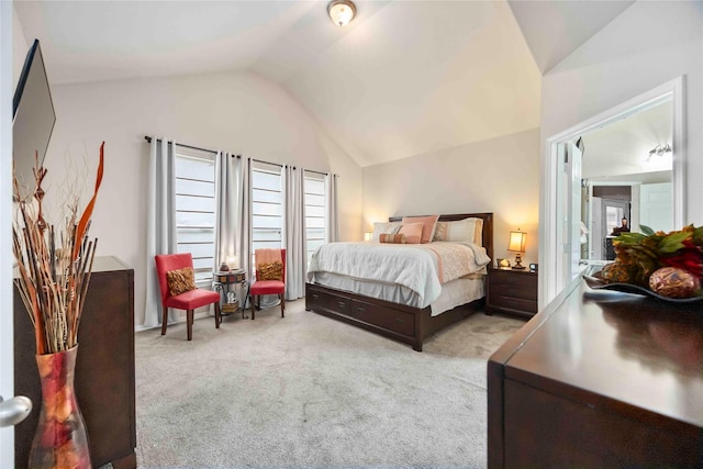 9859 Clanton Pines Dr, Humble, TX 77396 - bedroom with lofted ceiling and carpet flooring