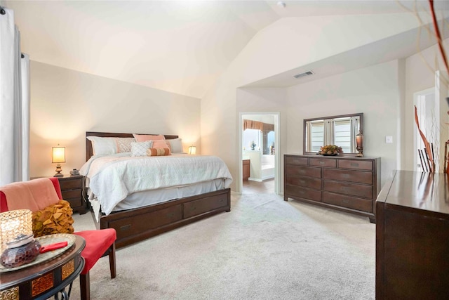 9859 Clanton Pines Dr, Humble, TX 77396 - carpeted bedroom with lofted ceiling and ensuite bath