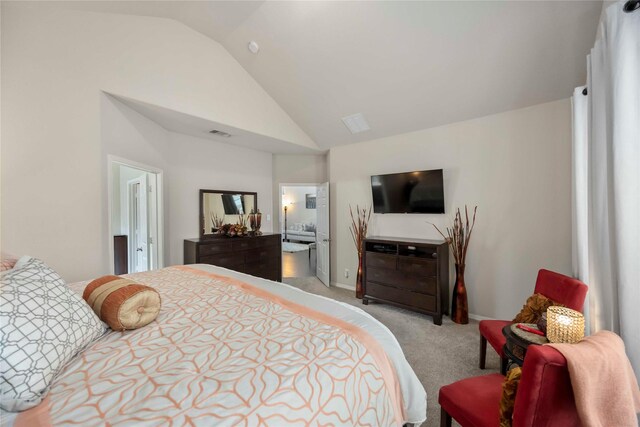 9859 Clanton Pines Dr, Humble, TX 77396 - bedroom with lofted ceiling and light carpet