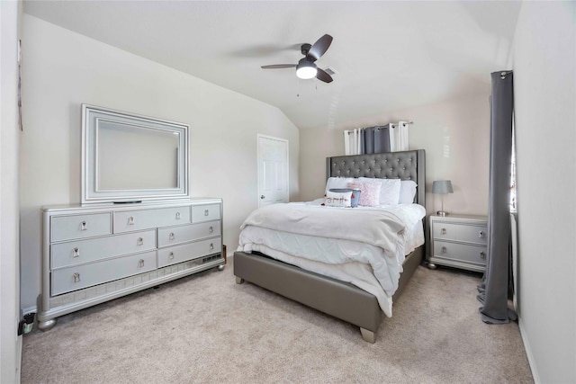 9859 Clanton Pines Dr, Humble, TX 77396 - carpeted bedroom with lofted ceiling and a ceiling fan
