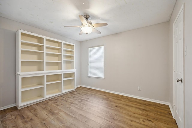 20703 Surrey Stone Ct, Katy, TX 77450 - empty room with ceiling fan and hardwood / wood-style floors