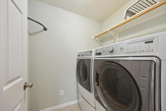 20703 Surrey Stone Ct, Katy, TX 77450 - washroom featuring washer and dryer and light tile patterned floors