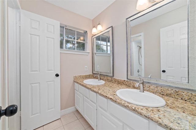 1102 Indian Autumn Trce, Houston, TX 77062 - full bath featuring double vanity, tile patterned flooring, and a shower