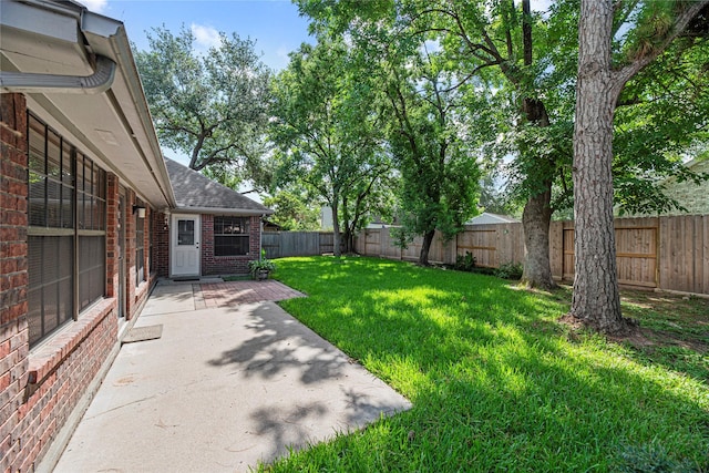 16307 Rainbow Lake Rd, Houston, TX 77095 - fenced backyard featuring a patio
