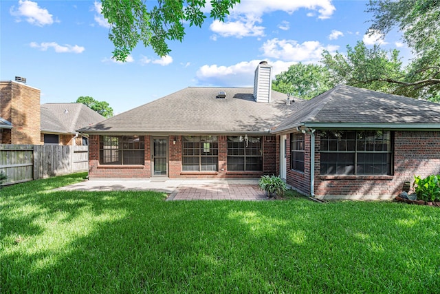 16307 Rainbow Lake Rd, Houston, TX 77095 - rear view of house with a patio area, a fenced backyard, and brick siding