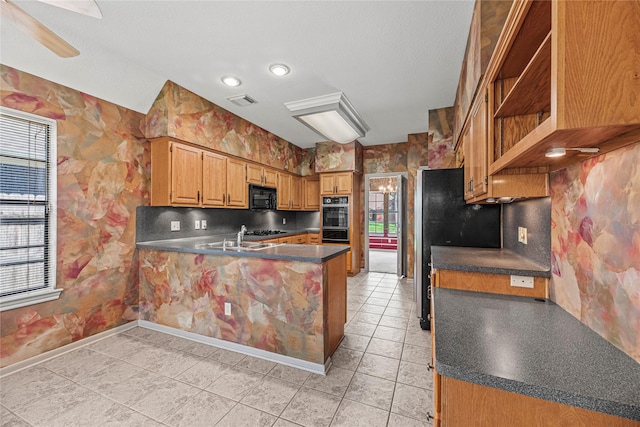 16307 Rainbow Lake Rd, Houston, TX 77095 - kitchen featuring black microwave, a peninsula, dark countertops, stainless steel gas stovetop, and light tile patterned flooring
