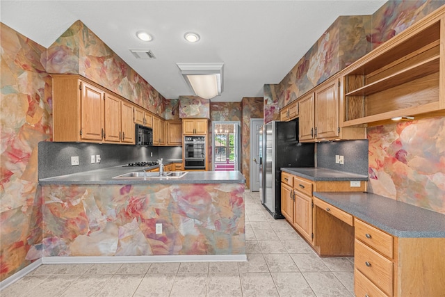 16307 Rainbow Lake Rd, Houston, TX 77095 - kitchen featuring black appliances, a peninsula, light tile patterned flooring, dark countertops, and open shelves