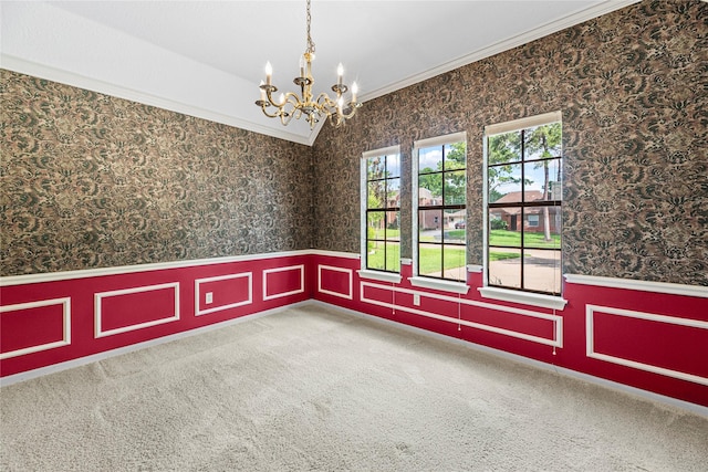 16307 Rainbow Lake Rd, Houston, TX 77095 - spare room featuring wainscoting, crown molding, a chandelier, wallpapered walls, and carpet floors