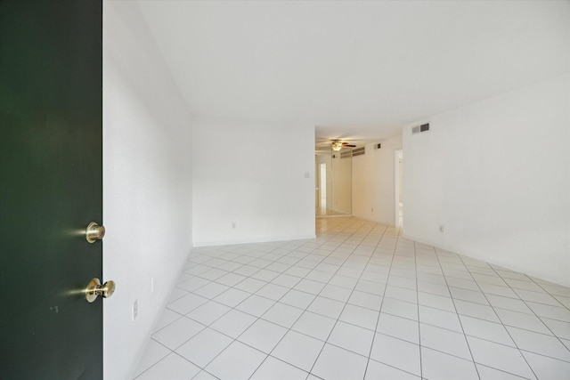 845 Augusta Dr Unit 17, Houston, TX 77057 - empty room featuring ceiling fan and light tile patterned floors