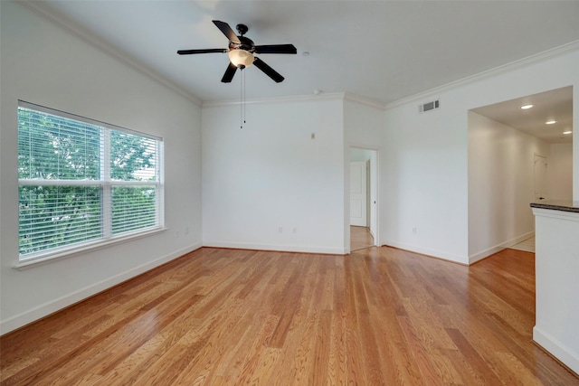 2203 Dorrington St Unit 406, Houston, TX 77030 - empty room with crown molding, light wood finished floors, and ceiling fan