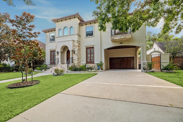 8518 Prichett Dr, Houston, TX 77096 - mediterranean / spanish house with a balcony, french doors, a garage, stucco siding, and a gate