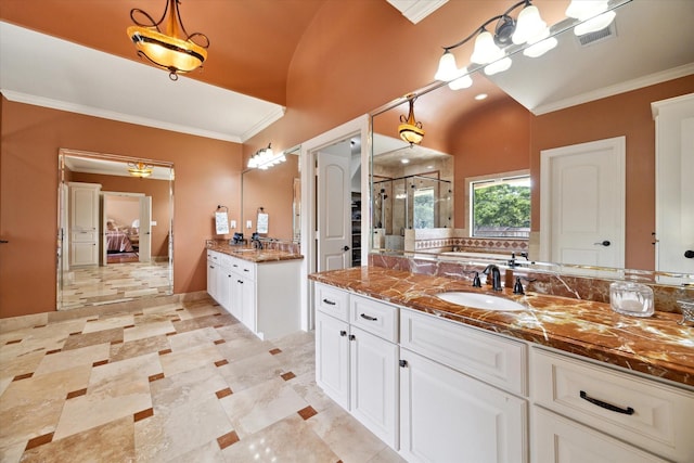 8518 Prichett Dr, Houston, TX 77096 - full bathroom with a shower stall, ornamental molding, and two vanities