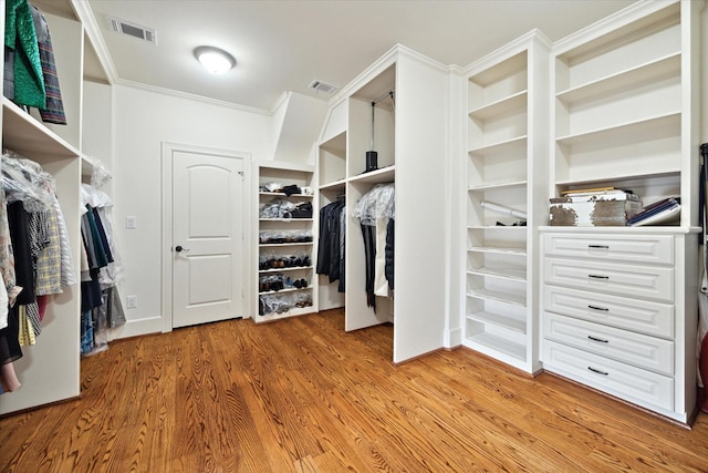 8518 Prichett Dr, Houston, TX 77096 - walk in closet featuring light wood finished floors