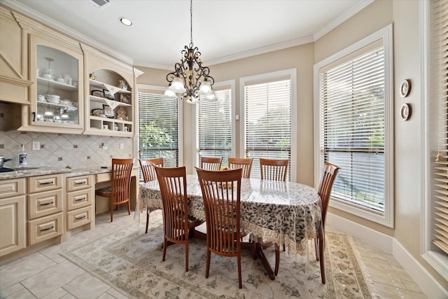 8518 Prichett Dr, Houston, TX 77096 - dining room with a chandelier, crown molding, a desk, recessed lighting, and light tile patterned floors
