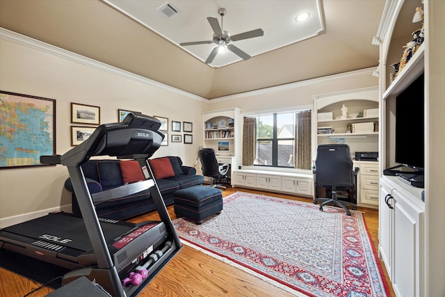 8518 Prichett Dr, Houston, TX 77096 - exercise room with a ceiling fan, ornamental molding, light wood-type flooring, and built in shelves
